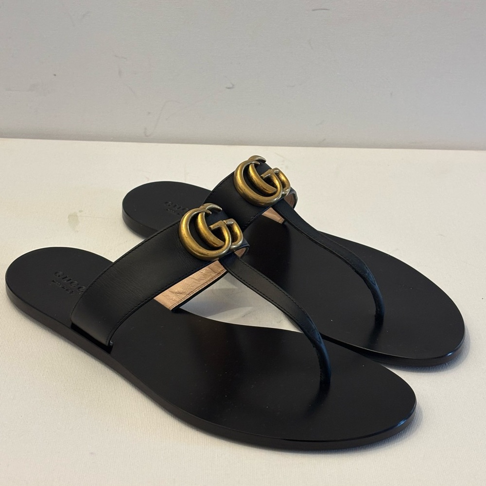 Gucci Black Sandals with Gold Accents